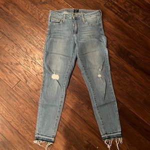 Just Black jeans, light blue with minimal rips, fringe at ankle